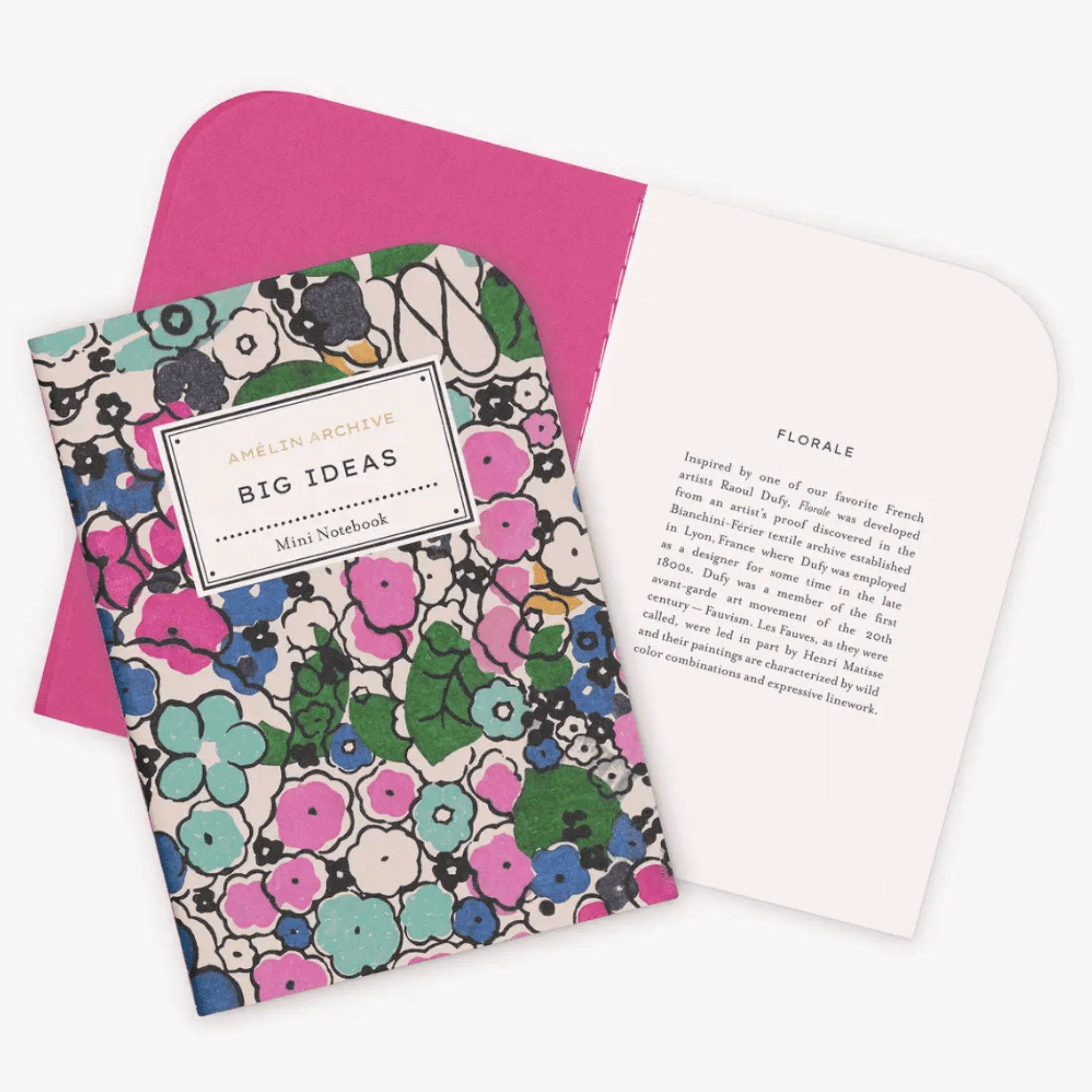 Colorful mini notebook with floral cover and bold 'BIG IDEAS' title, featuring bright pink inside pages.