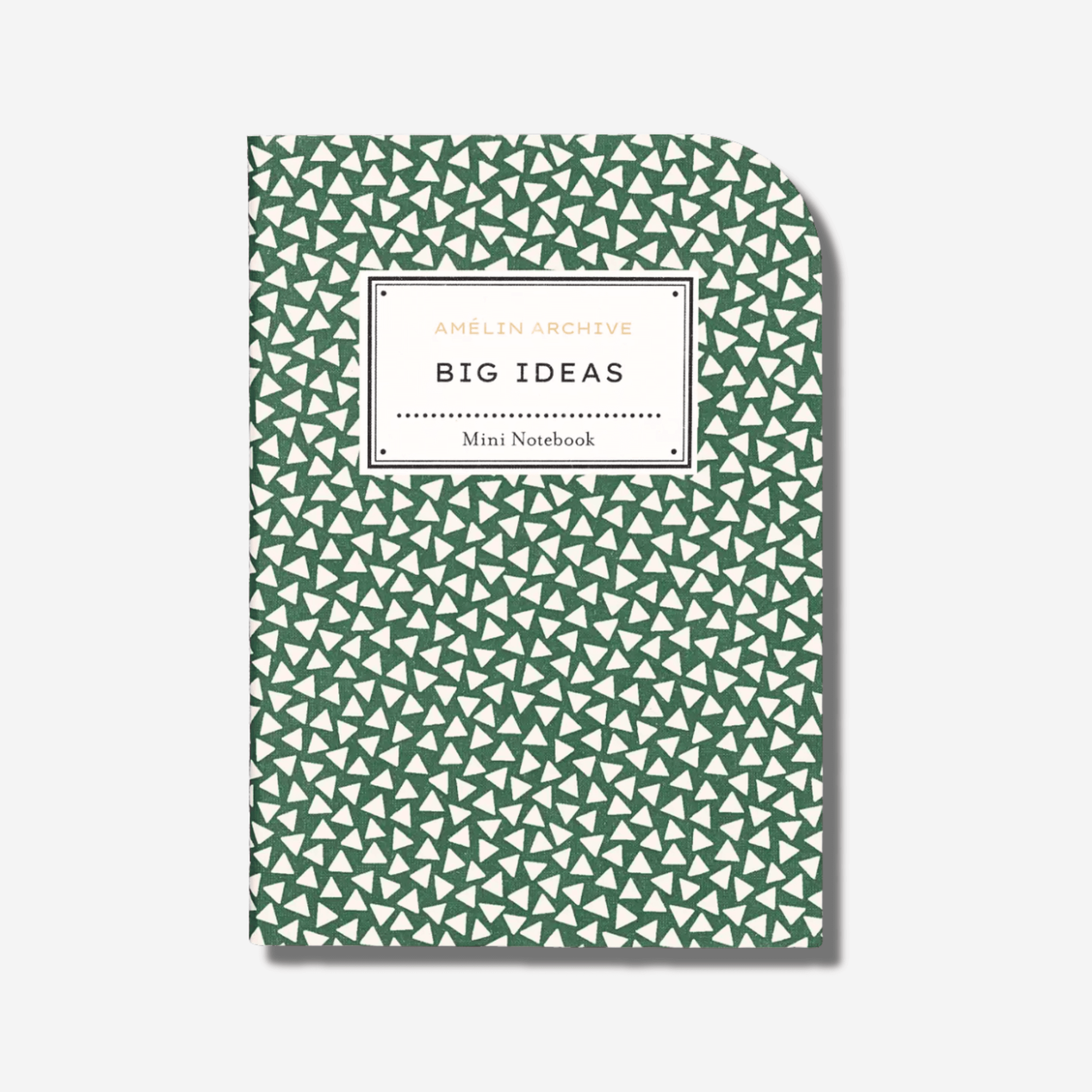 Big Ideas mini notebook in green with geometric patterns, perfect for jotting down thoughts and sketches.