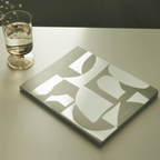 Pieces of You Journal on a table next to a glass of water, inviting playful self-discovery and reflection.