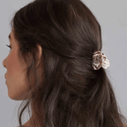 Model showcasing a stylish mini hair claw clip in rich agate pattern, perfect for elegant updos and everyday hair styles.