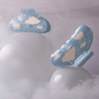 Dreamy blue hair claws with white clouds, embodying a serene sky, perfect for elevating everyday style.