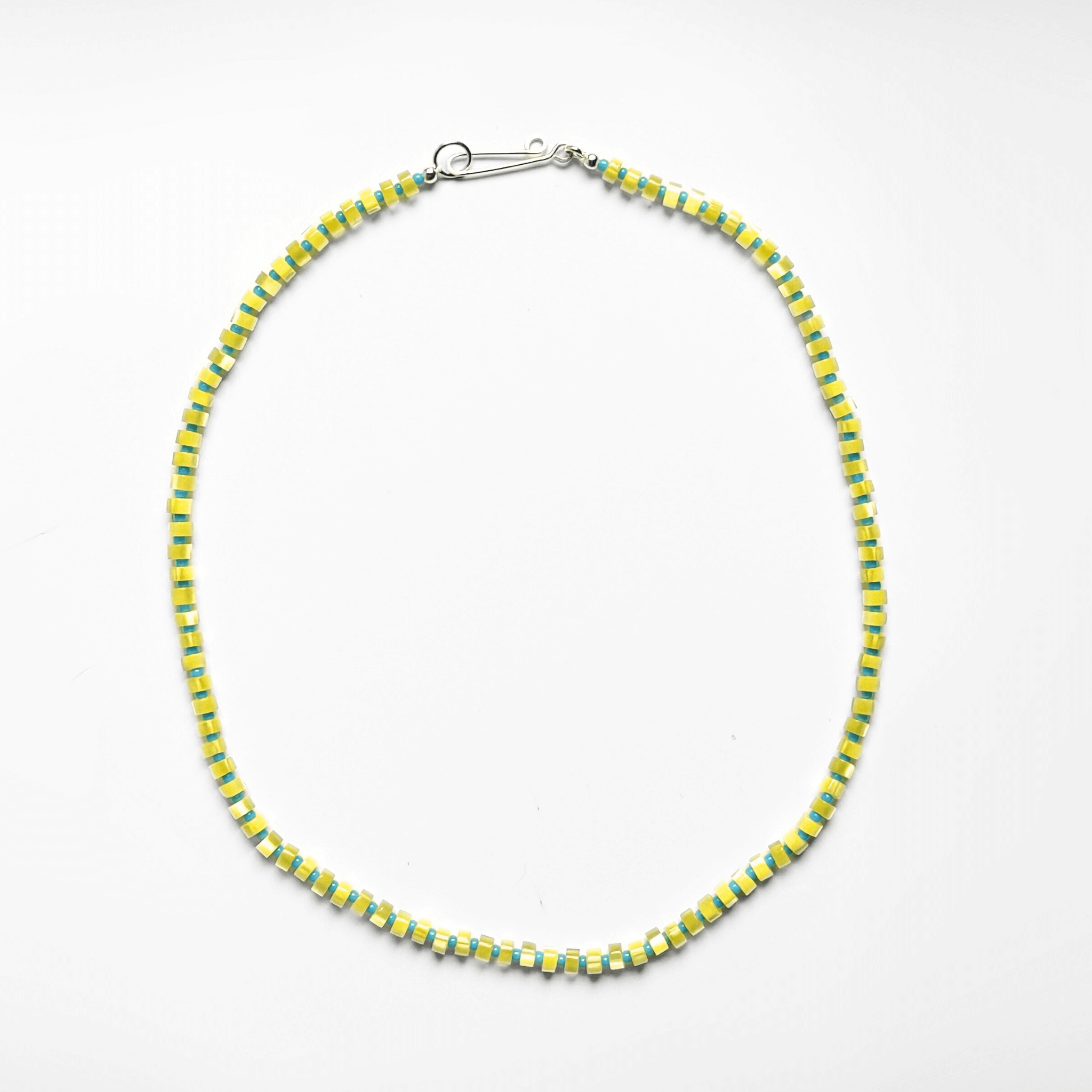 Hand-strung Galileo Necklace featuring colorful Japanese seed beads and sterling silver accents, perfect for layering.