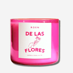 Pink candle labeled 'DE LAS FLORES' inspired by Mexico City's flower market aroma.