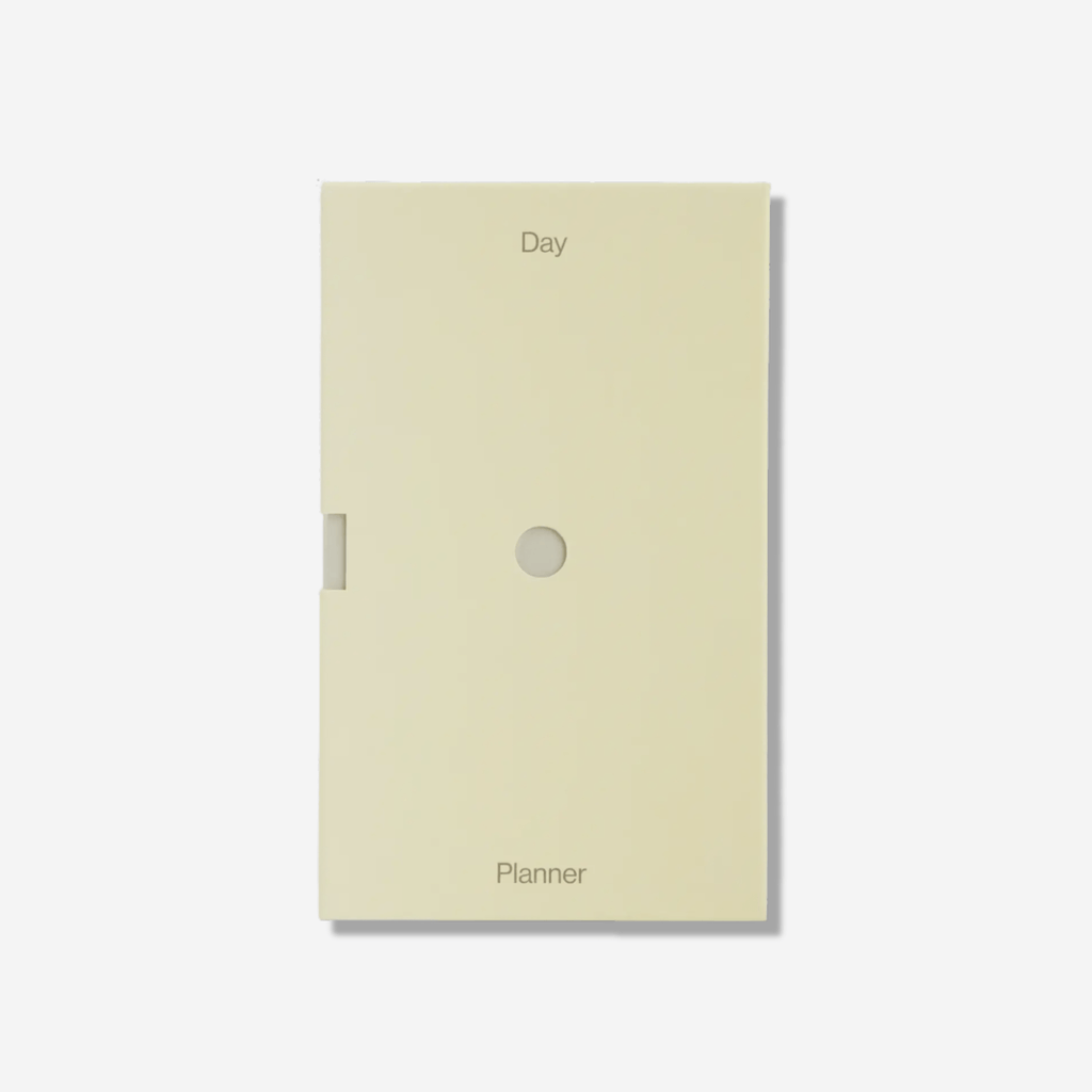 Stylish Day Planner cover in soft yellow, designed for mindful daily organization and reflection.