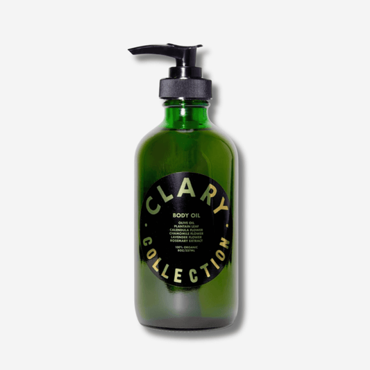 Clary Collection 8oz nourishing body oil in a green glass bottle with pump dispenser for hydration and skin repair.