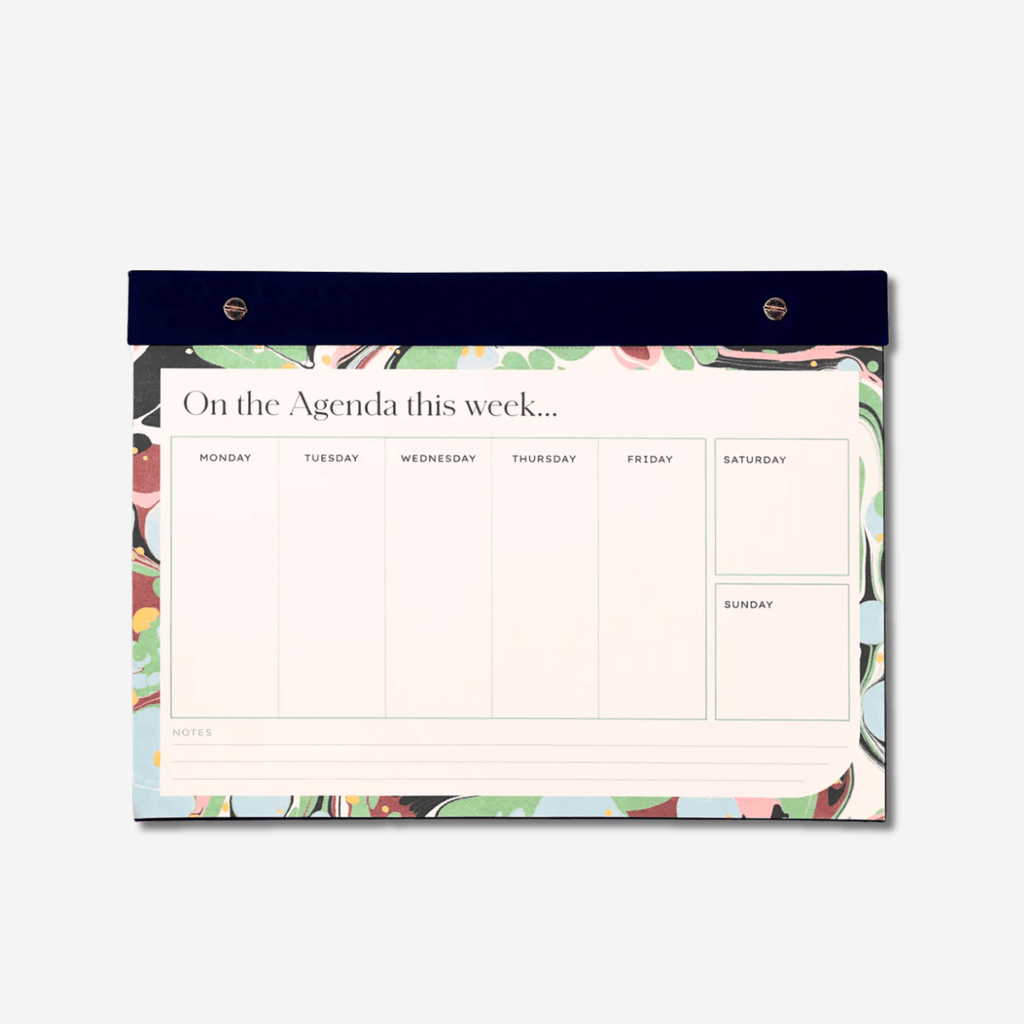 Stylish weekly desk planner featuring a colorful design and space for notes, ideal for organizing daily tasks.