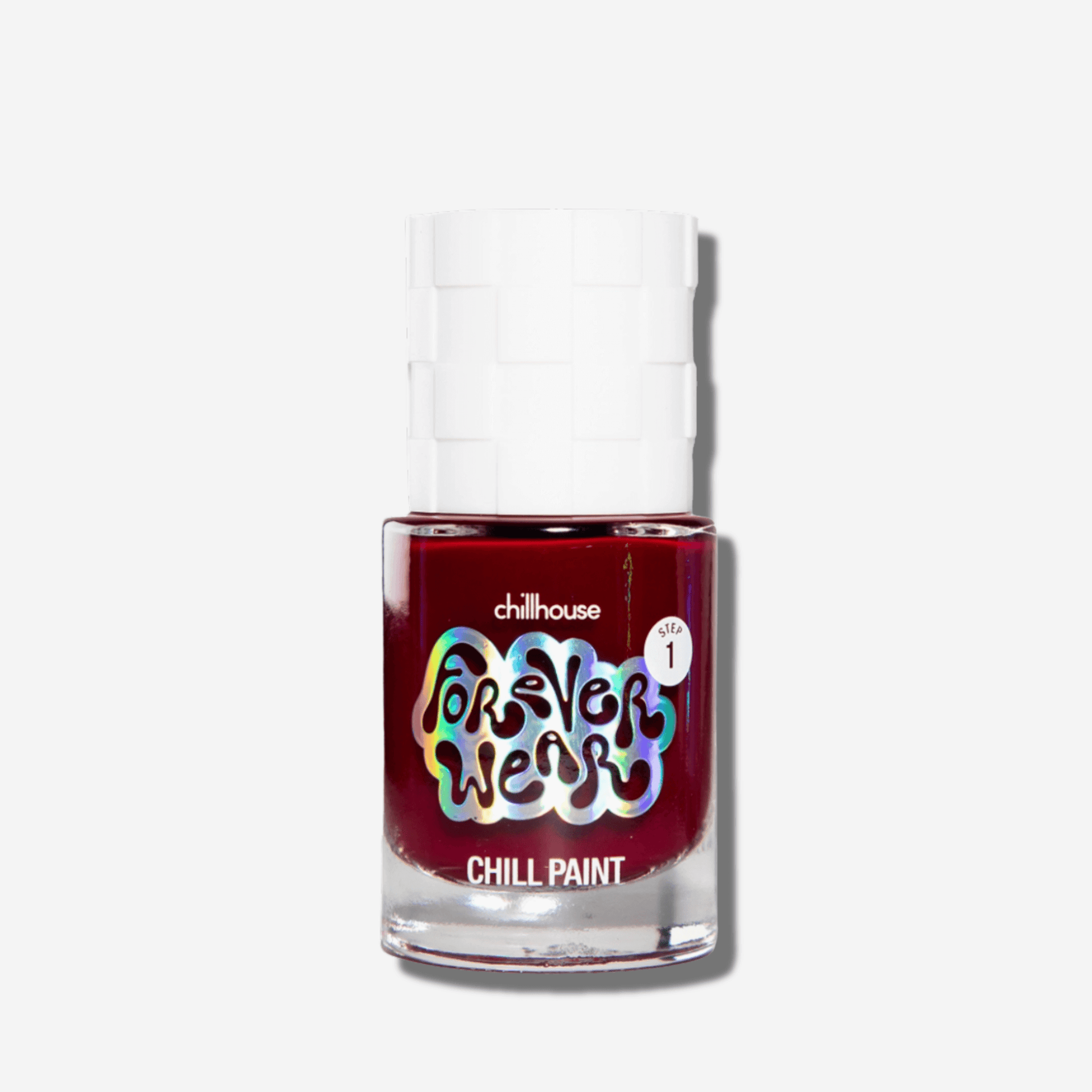 Forever Wear Chill Paint in Natty Wine, a long-lasting red nail polish for chip-resistant manicures.