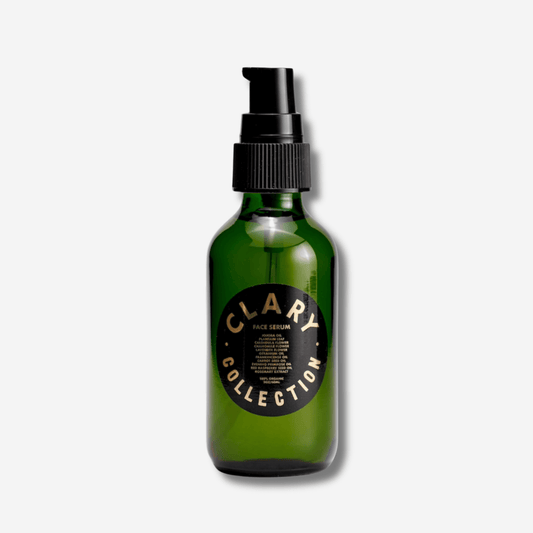 Clary Collection Face Serum in green glass bottle, featuring organic botanicals for hydrating and balancing skin.