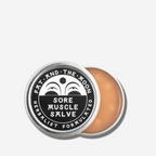 Fat and the Moon Sore Muscle Salve in a round tin for effective muscle tension relief and comfort.