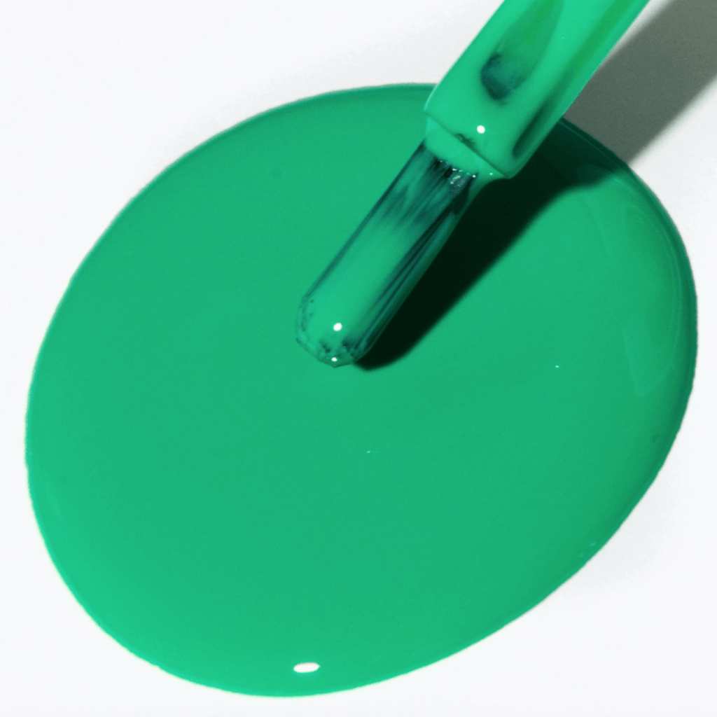 Vibrant jade green nail polish from Forever Wear Chill Paint, showcasing a glossy gel-like finish.