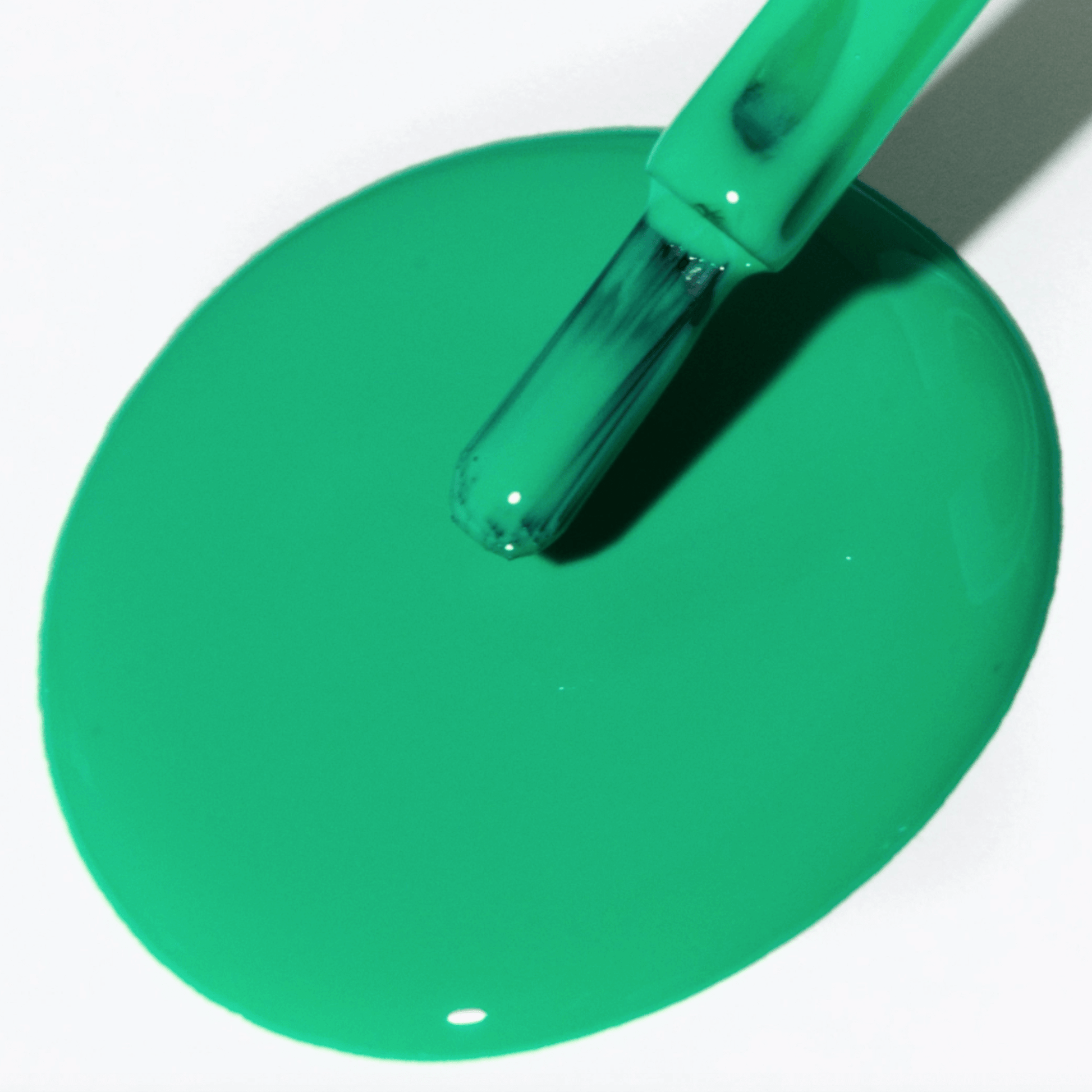 Vibrant jade green nail polish from Forever Wear Chill Paint, showcasing a glossy gel-like finish.