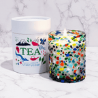 Cozy tea bubble glass candle by Putnam Design with colorful sculptural vessel and custom artwork.