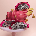 Vibrant dragon fruit-inspired hair claw clips in pink and speckled design, perfect for playful hair styling.