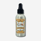 Goldie’s After Sun Spray in a silver bottle, a soothing blend for sun-soaked skin care and hydration.