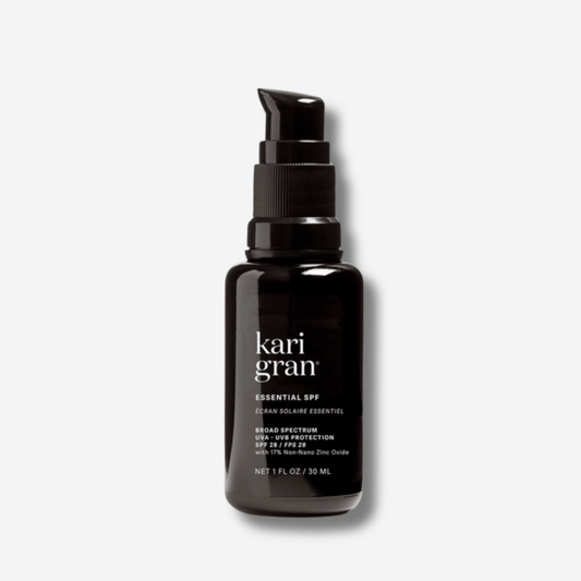 Kari Gran Essential SPF 30 oil-based mineral sunscreen in a 1 fl oz pump bottle with broad-spectrum protection.