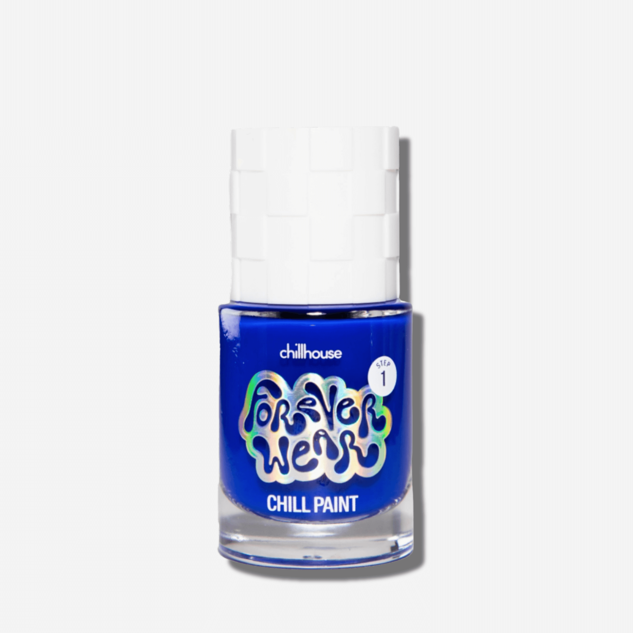 Forever Wear Chill Paint in vibrant cobalt blue, a long-lasting junk-free nail polish for striking manicures.