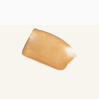 Swatch of Kari Gran's Essential Tinted SPF 30, showcasing its warm, radiant tone for a dewy finish.