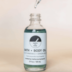Bath and Body Oil bottle with blue chamomile and sandalwood, crafted by California herbalists, 2 oz for deep hydration.