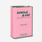 Pink can of Single & Fat Organic Extra Virgin Olive Oil, highlighting its bold and unique packaging.