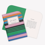 Colorful BIG IDEAS mini notebook with bold stripes and green inner cover, perfect for notes and sketches.
