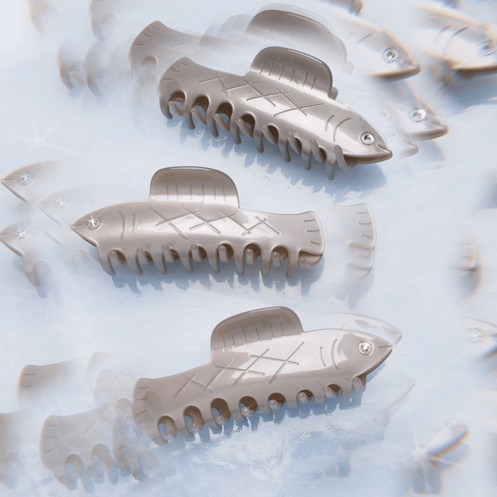 HERRING HAIR CLAW - Winona Irene featuring multiple fish-shaped hair clips in glossy finish.