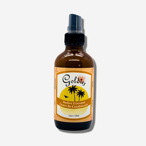 Amber Coconut Leave-In Conditioner by Goldie's in a 4.5oz bottle, featuring palm trees and a beachy vibe.