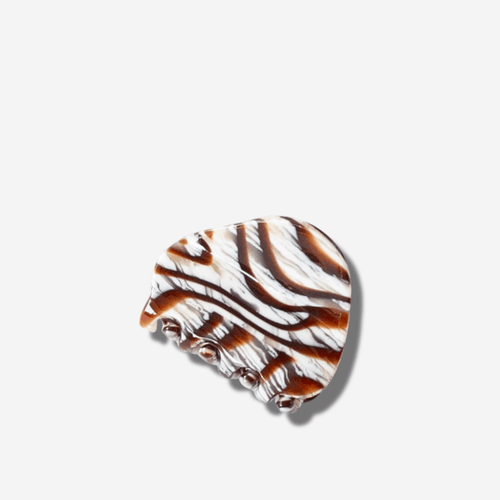 Brown and cream agate hair claw clip featuring a stylish zebra swirl pattern, perfect for effortless hairdos.