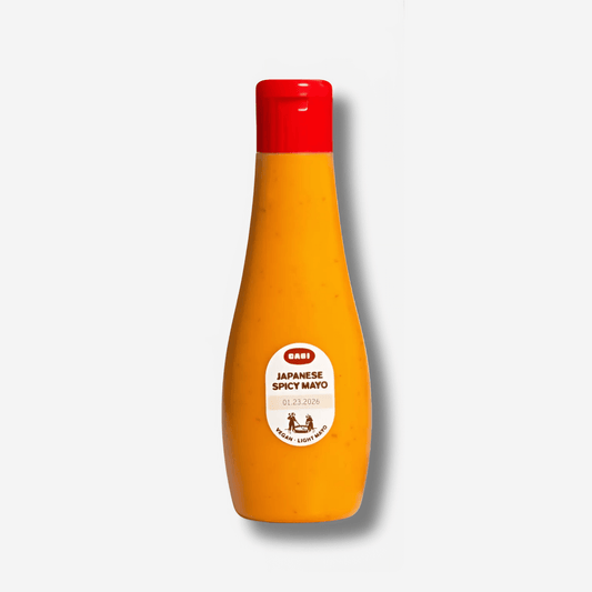 Bottle of Cabi Japanese Spicy Mayo, creamy, dairy-free condiment with a bold umami flavor.