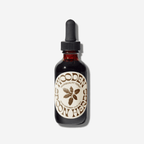 Wooden Spoon Herbs Tranquility Tonic, a calming herbal tincture for stress relief and inner peace.
