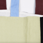 Close-up of the two-tone linen tote bag in Slowdance, featuring a soft texture and uniquely colored straps.