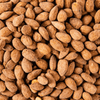 Close-up of roasted Brazen Buffalo Wing Spiced Almonds, showcasing their rich, crunchy texture and savory flavor.