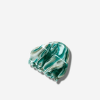Agate hair claw in green with swirling patterns, eco-friendly, perfect for all hair types.
