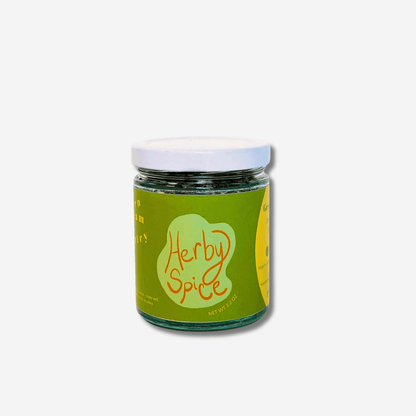 Herby Spice jar by Green Dream Pantry showcasing vibrant green seasoning for elevating dishes.