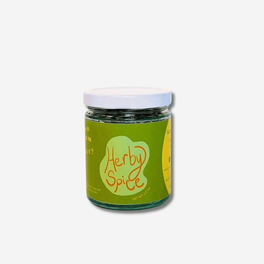 Herby Spice jar by Green Dream Pantry showcasing vibrant green seasoning for elevating dishes.