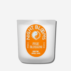 Night Blooms Pixie Blossom candle, 3 oz, citrusy floral scent with a bright orange label, perfect for spring.