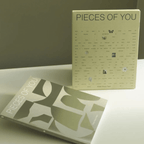 Two Pieces of You Journals on a table, promoting self-discovery and creativity through guided journaling.